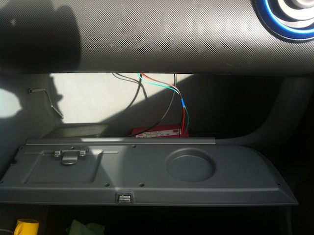 Arduino Uno and Raspberry Pi in glovebox.jpg